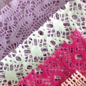 全涤弹力针织网眼网布提花服装时装面料批发 女装时装用布 蕾丝镂空