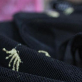 平面绣网布 全涤梭织绣花服装面料