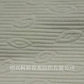 全涤弹力针织提花布 几何图形眼睛花提花布 女装时尚外套