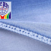 厂家直销供应 棉氨弹力斜纹经纬竹节牛仔布料 春夏衬衫连衣裙面料