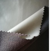 雾面平纹牛奶丝黑色PU皮裤女装面料。260克