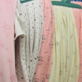 钻石绒压花100%T全涤针织布服装面料