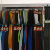 弹力仿真皮100%T全涤针织布服装面料染色布