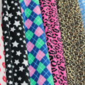 160针织染色全涤印花绒类向种服装面料