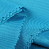 100%涤纶经编布 高温布 百褶布 压褶布压花布全涤针织面料 进口机压皱压花服装面料