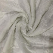 现货色织大树叶剪花图案 全涤面料 服装面料轻薄透气女装面料